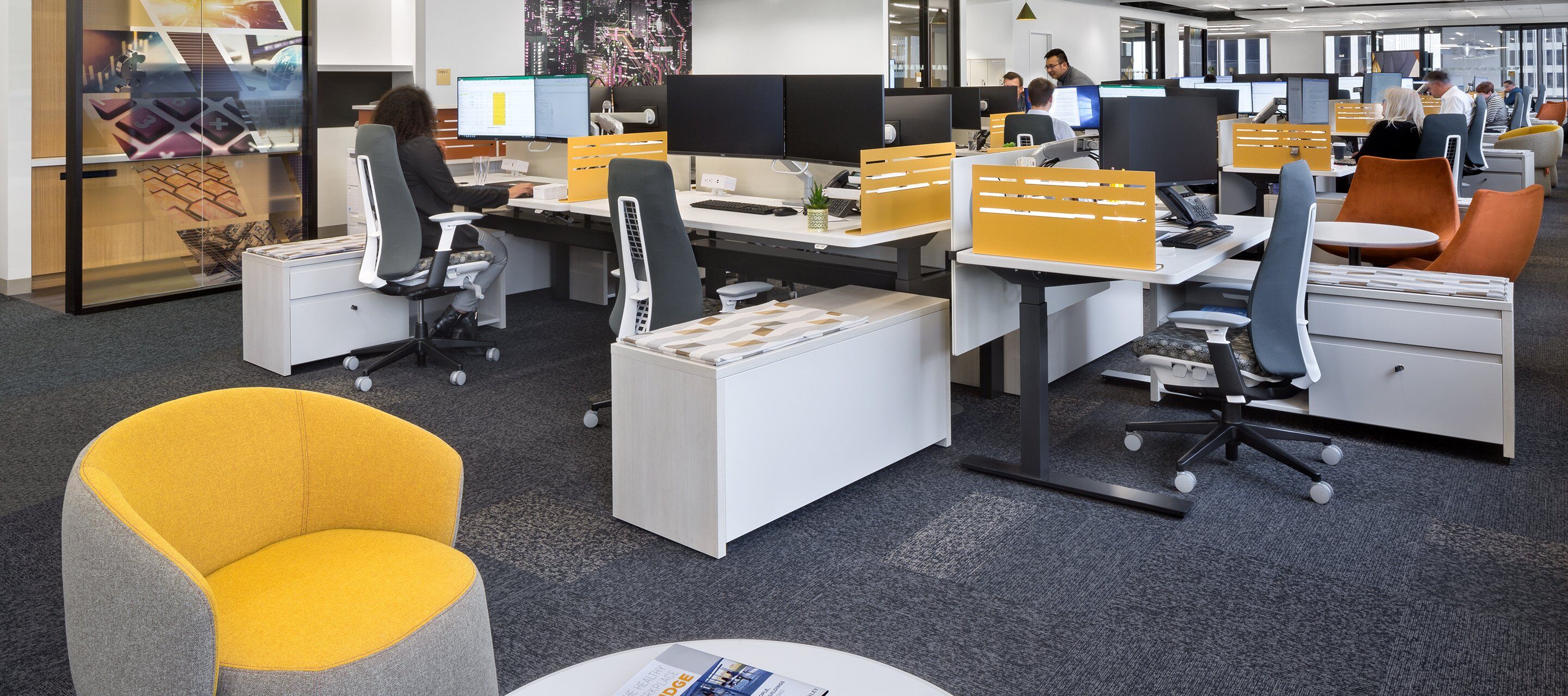 workstations in an open floor plan 